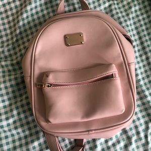 Baby pink faux leather mini backpack